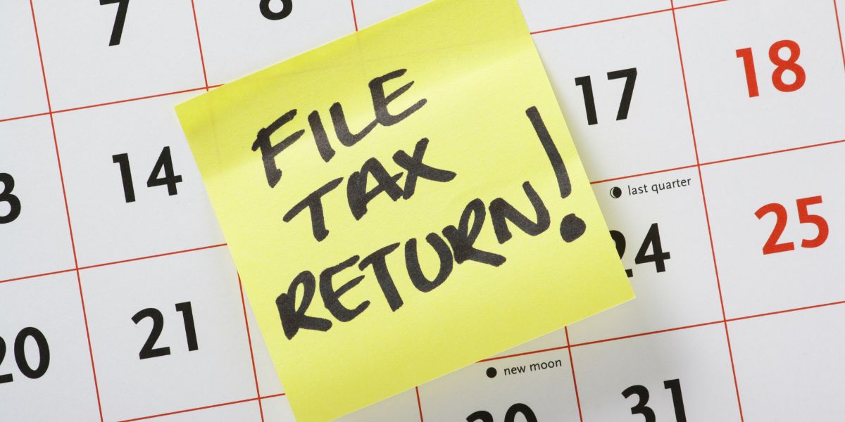 Image reads "File Tax Return" which is relevant to the article which about filing taxes for self-employed individuals